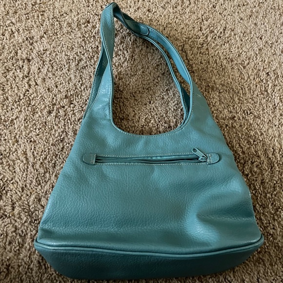 Turquoise colored shoulder bag. Has separate inside compartments. 13” X 9”. - Picture 2 of 5